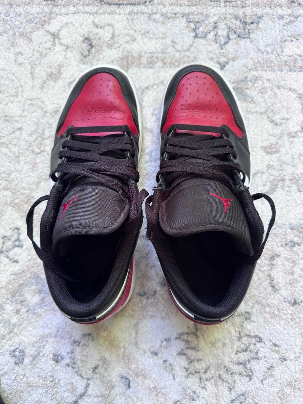 Air Jordan Low Top Sneakers in black & red